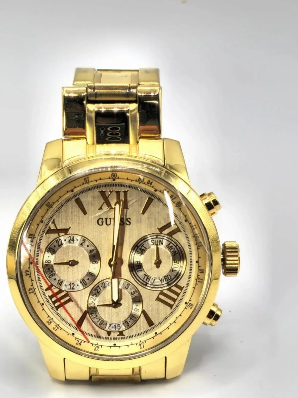 GUESS U0330L1 Women's Gold-Tone Multifunction Bracelet Watch